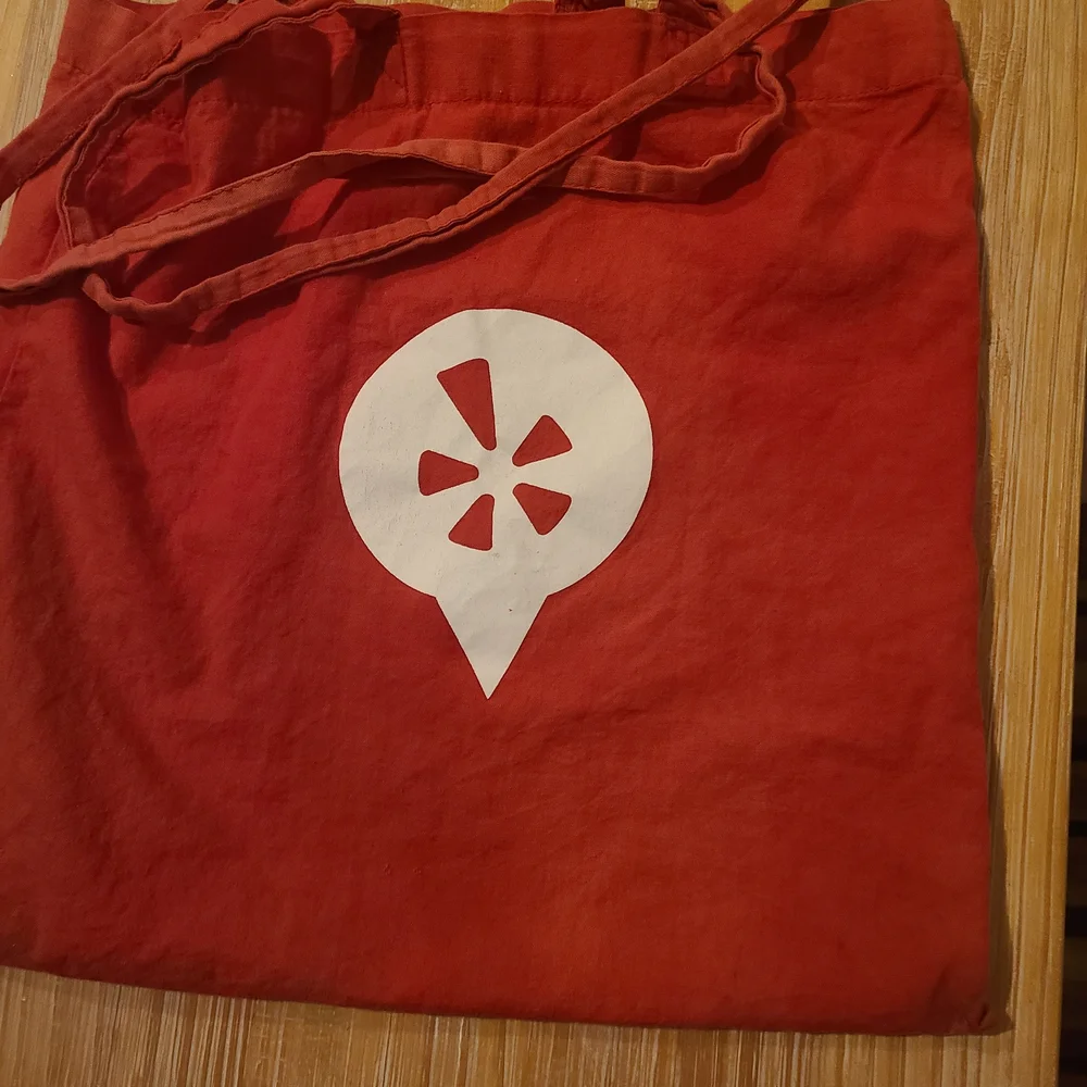 Elite 2014 White Beach Towel with Red and Yellow Icons